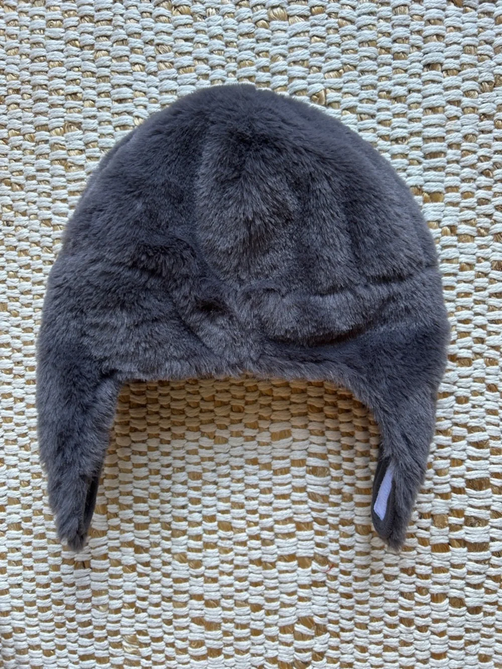 Carrer’s fuzzy penguin baby hat